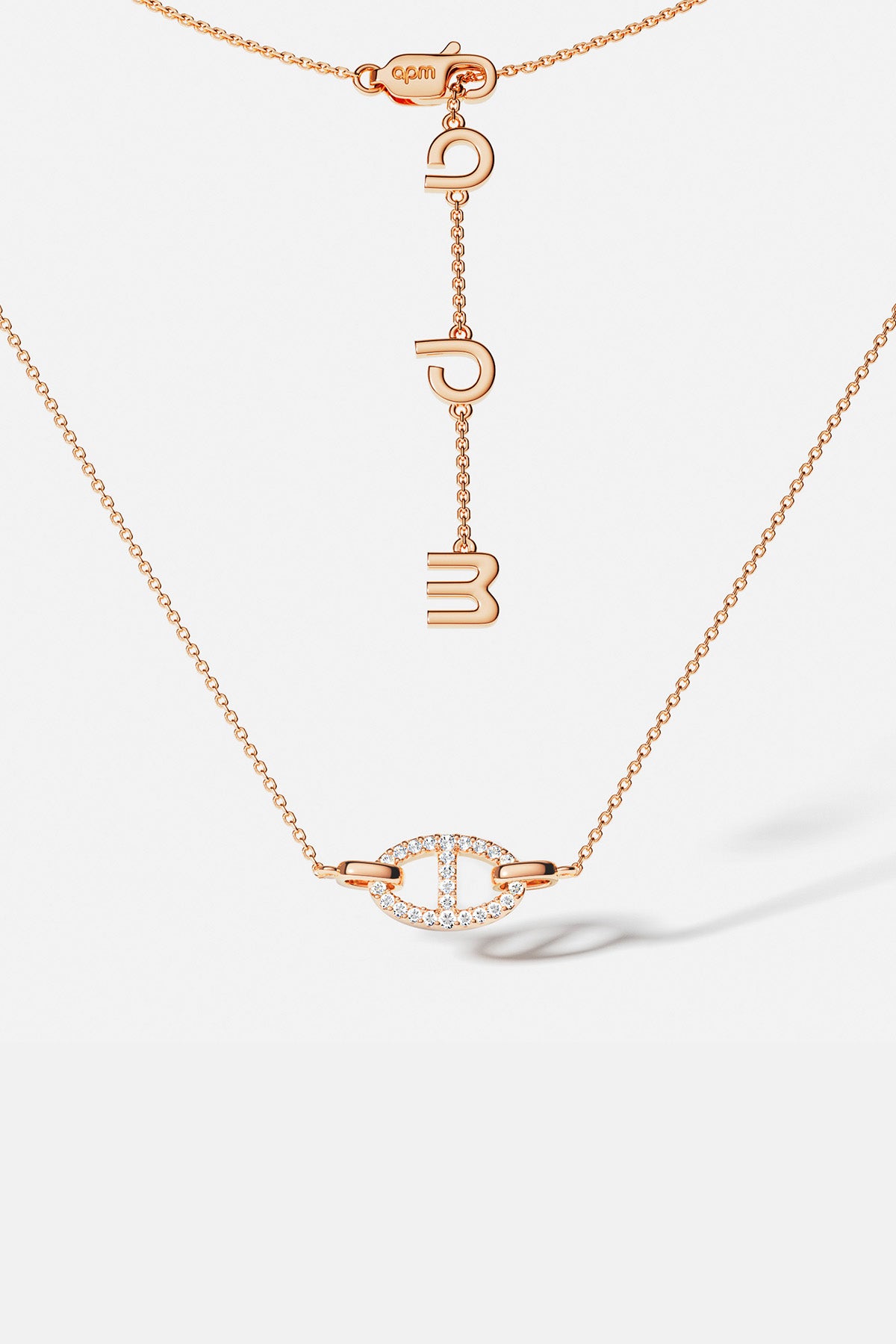 APM Morse Necklace in rose color, a delicate signature glimmering with quiet confidence.
