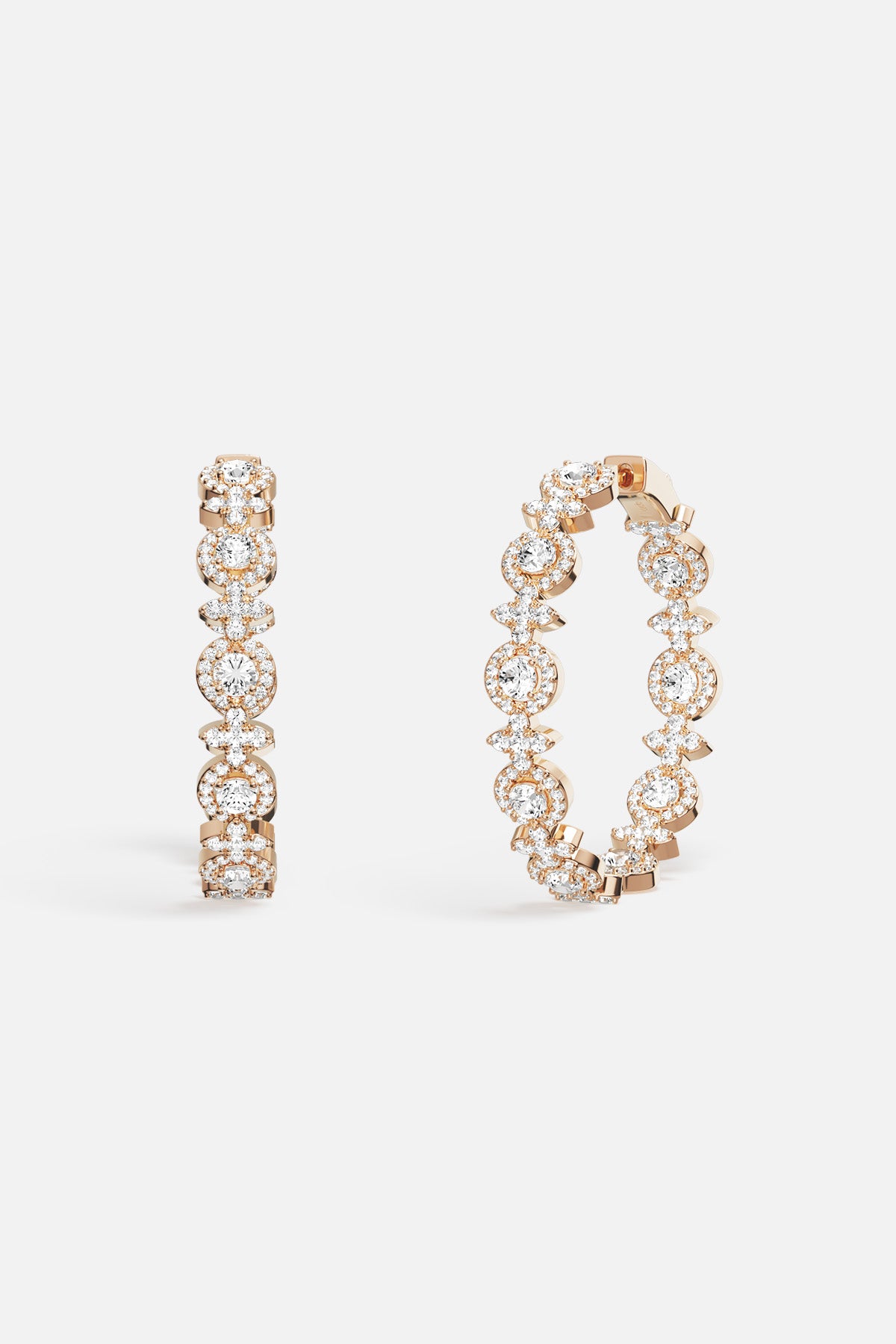 APM Hoop Earrings, a shimmering constellation of light for effortless radiance.