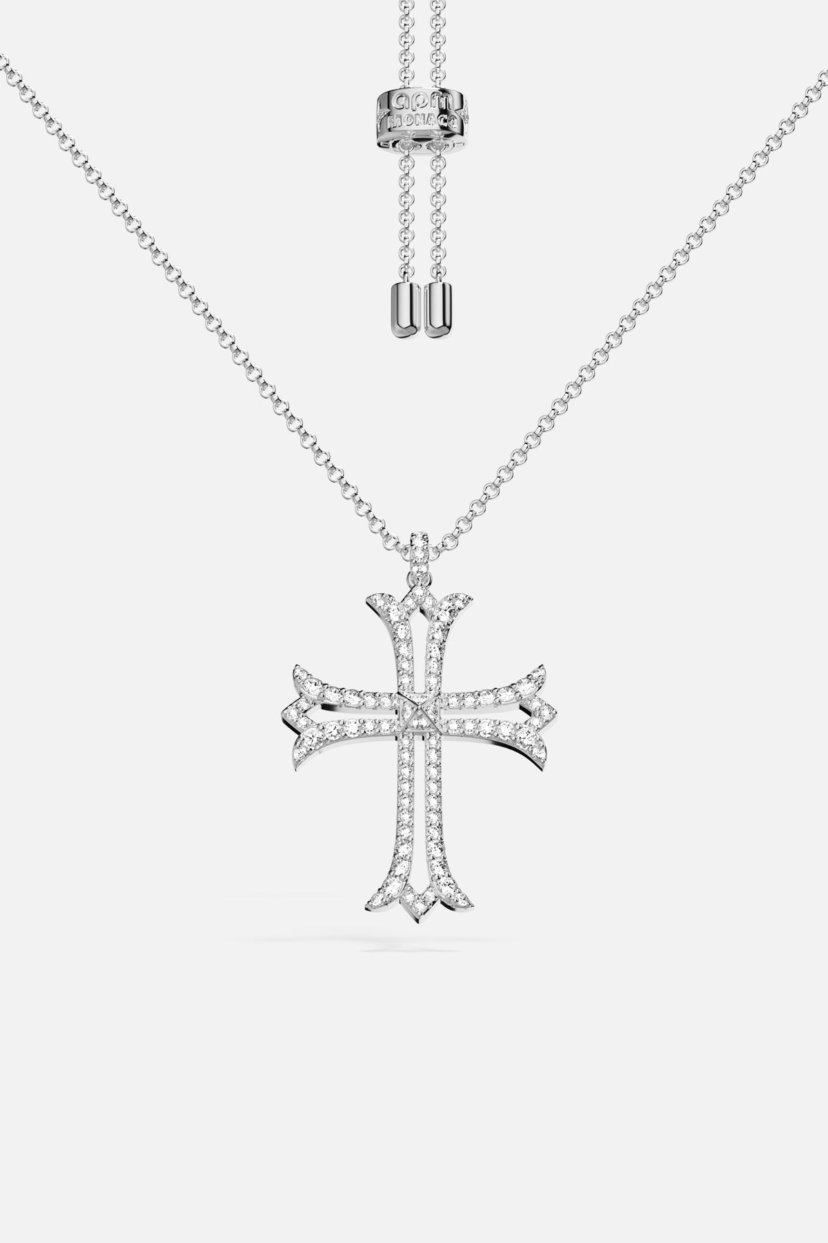APM Cross Necklace, a bold emblem shimmering with quiet elegance and modern edge.