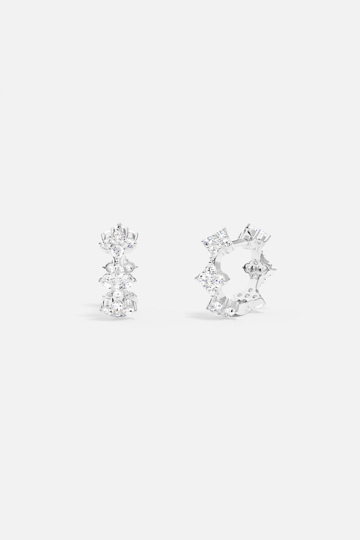 APM Monaco hoop earrings, a delicate sparkle in rhodium finish.