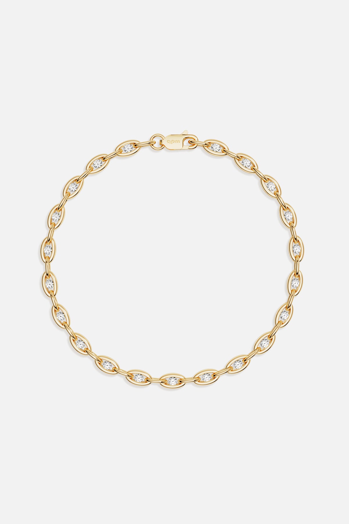 APM Bracelet in gold color, delicate links shimmering with effortless modern elegance.