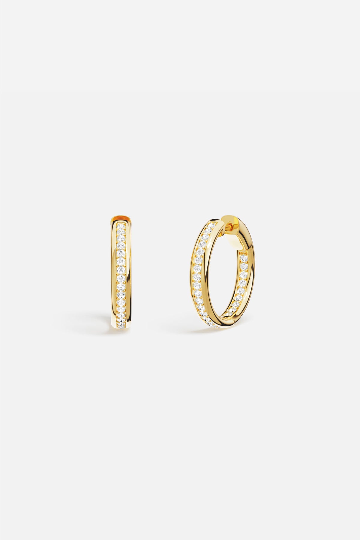 APM Hoop Earrings in golden hues, a luminous everyday essential with quiet elegance.
