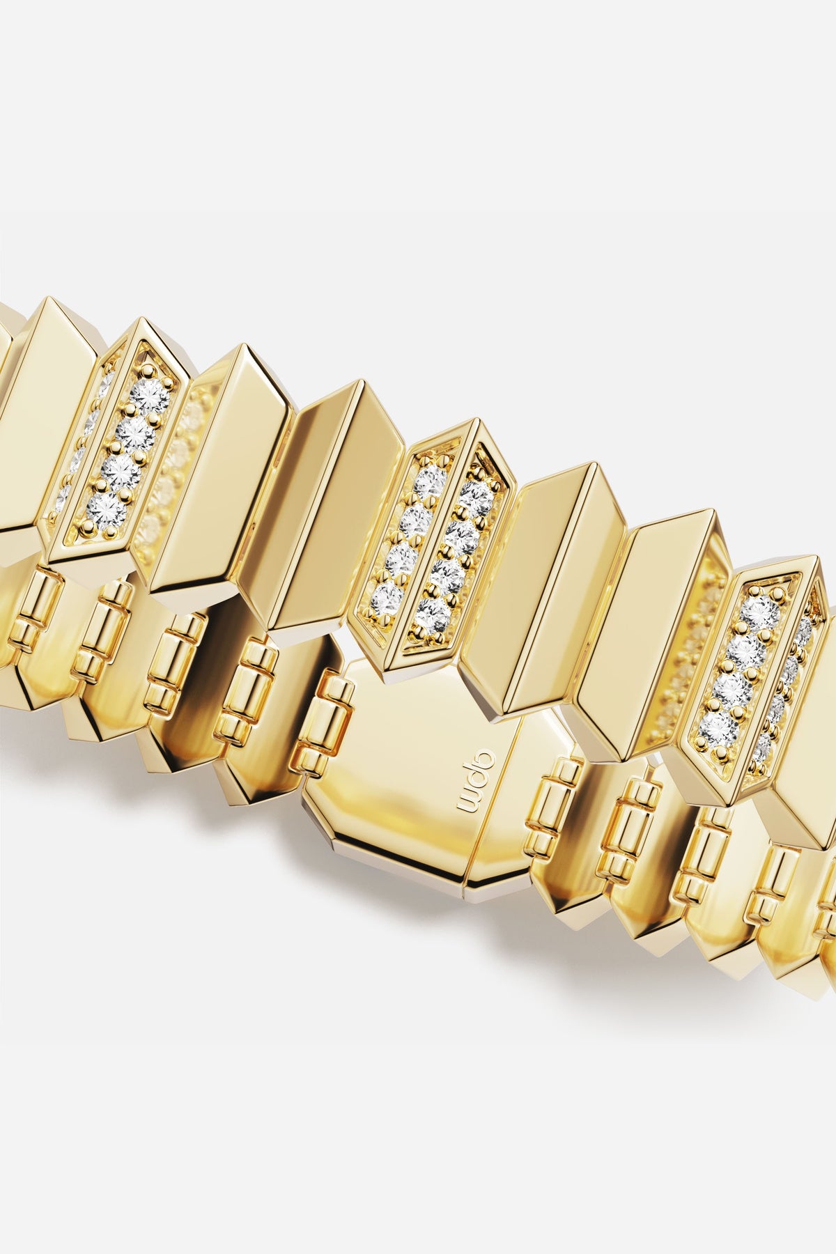 APM Bracelet in golden color, sculpted links glimmering with modern edge.