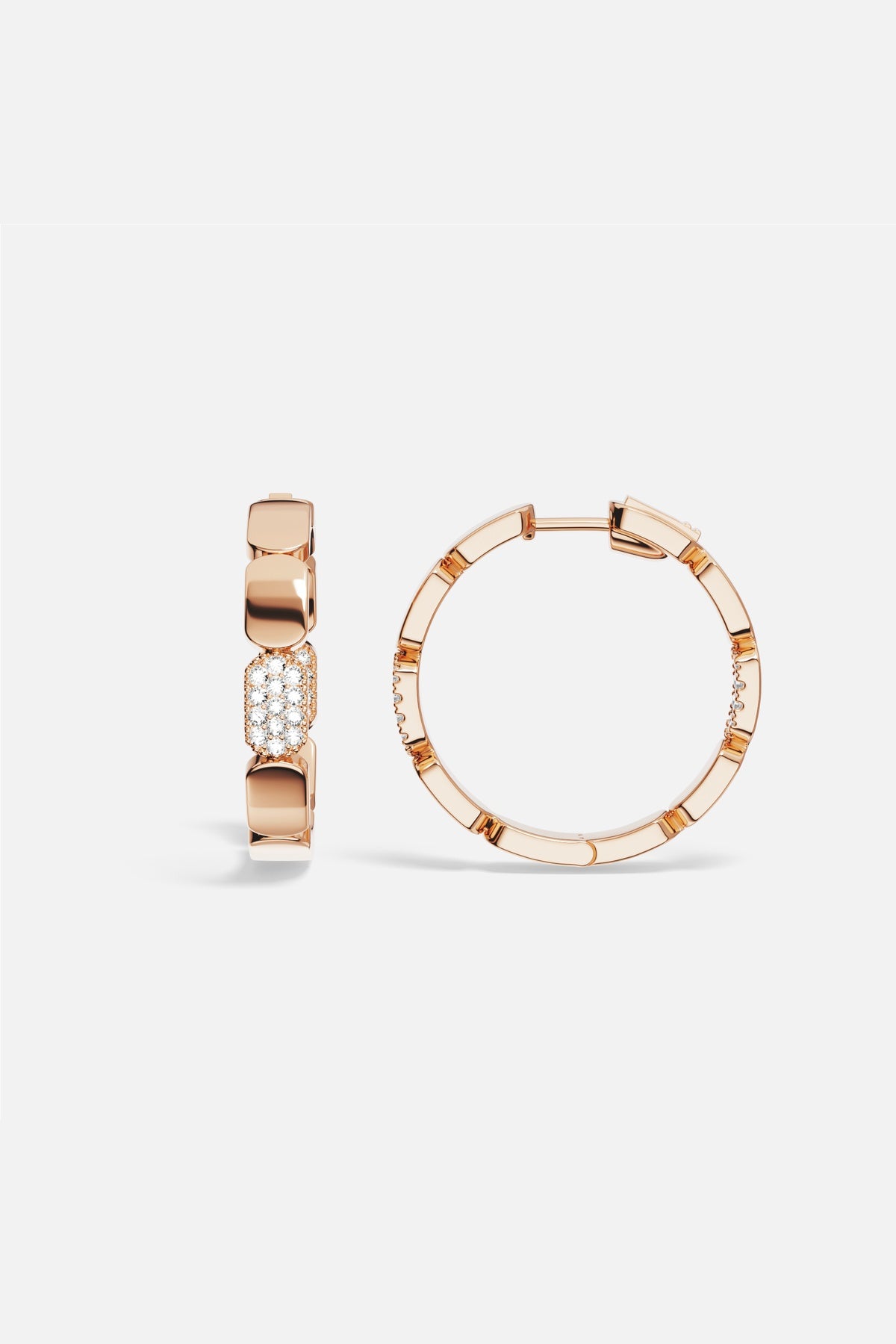 APM Hoop Earrings in a warm rose color, sculpted brilliance with an effortless glow.