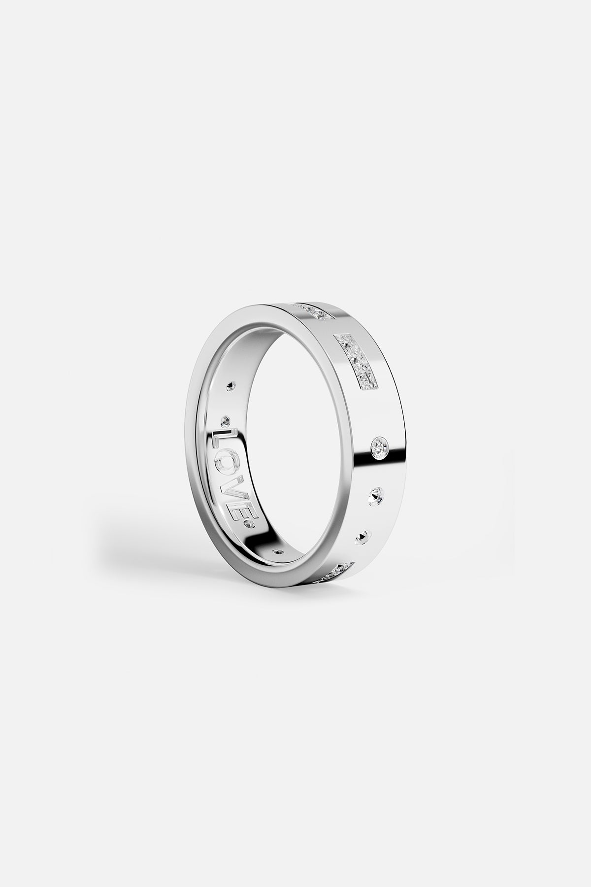 APM Ring in rhodium finish, a luminous whisper of love and modern romance.