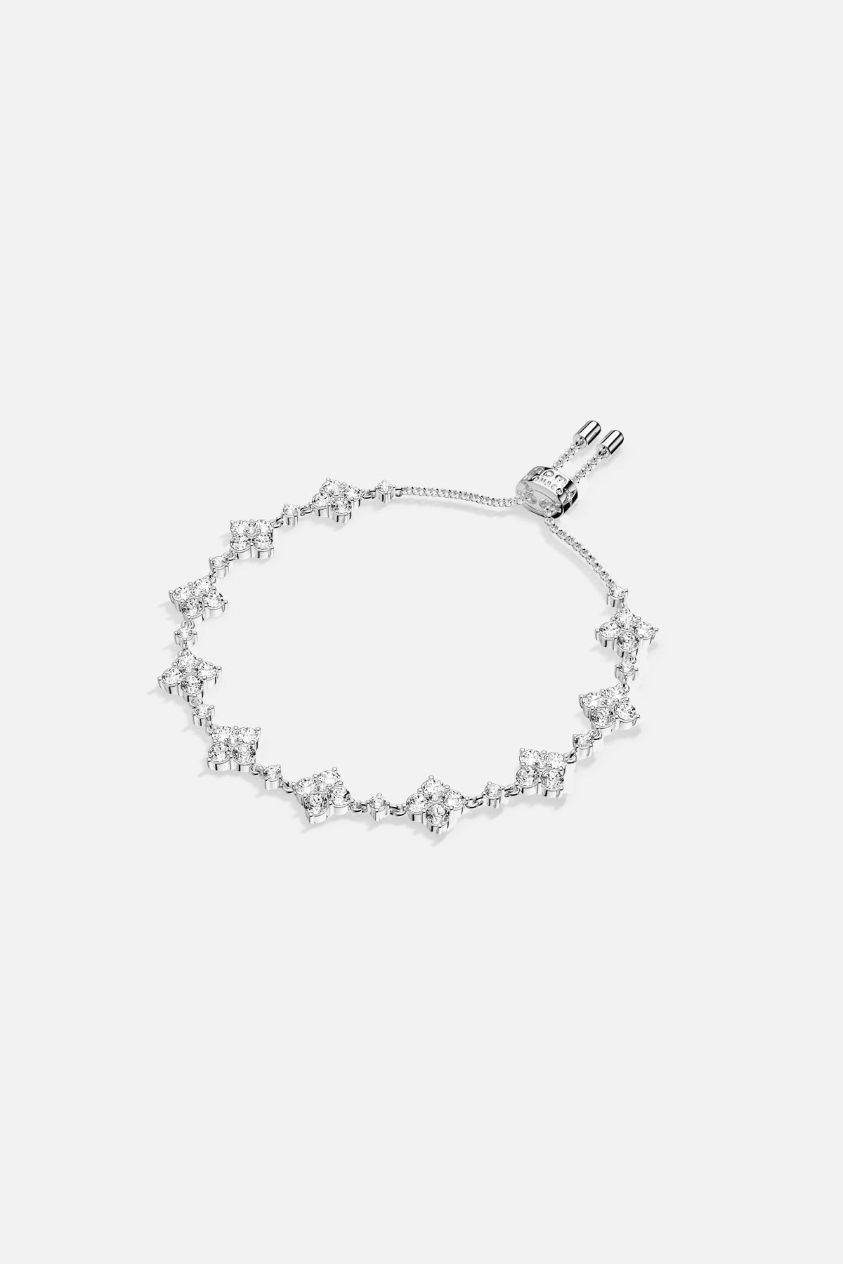 APM Bracelet in rhodium finish, a delicate constellation of light around the wrist.