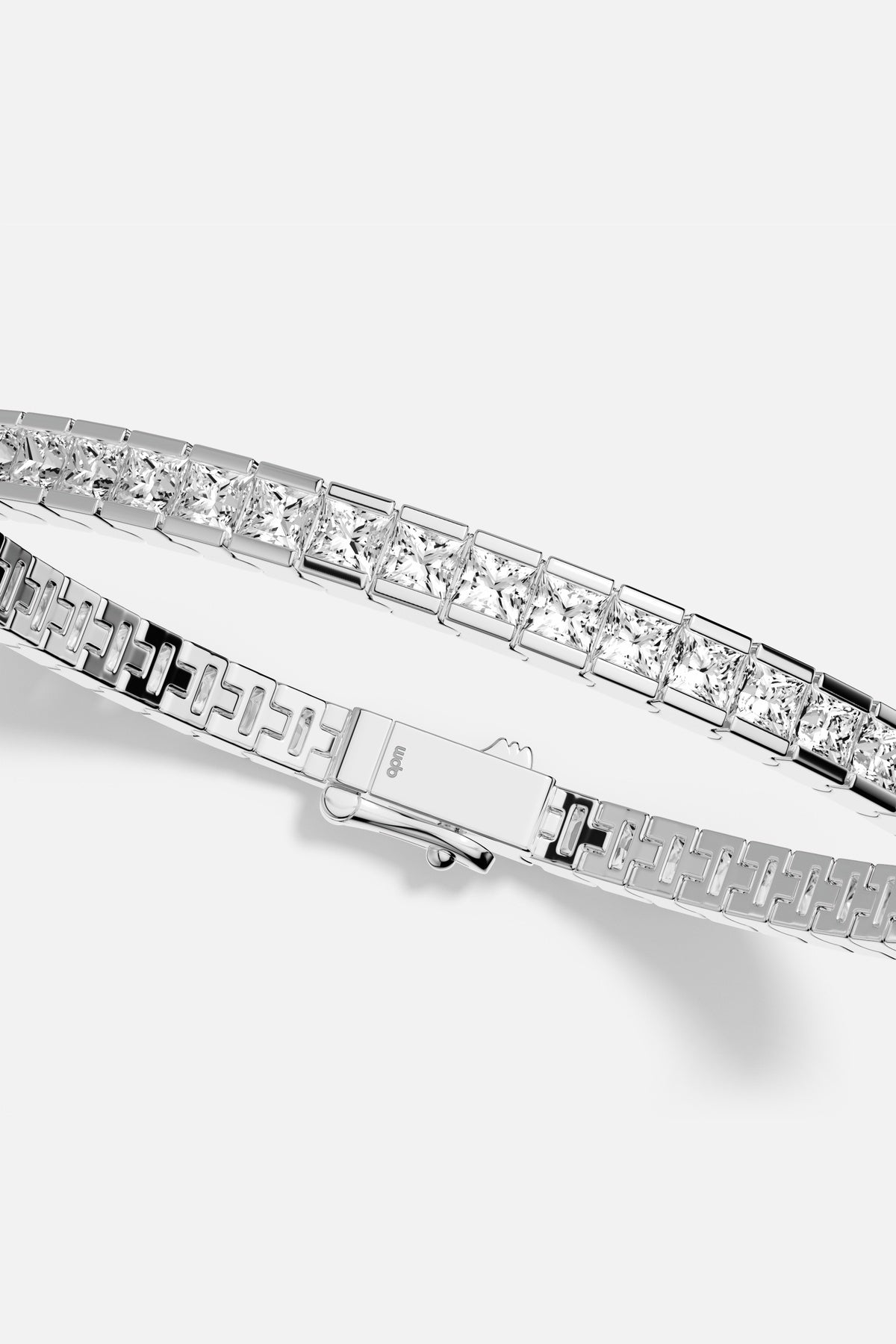 APM Tennis Bracelet in rhodium finish, a luminous line of quiet confidence.