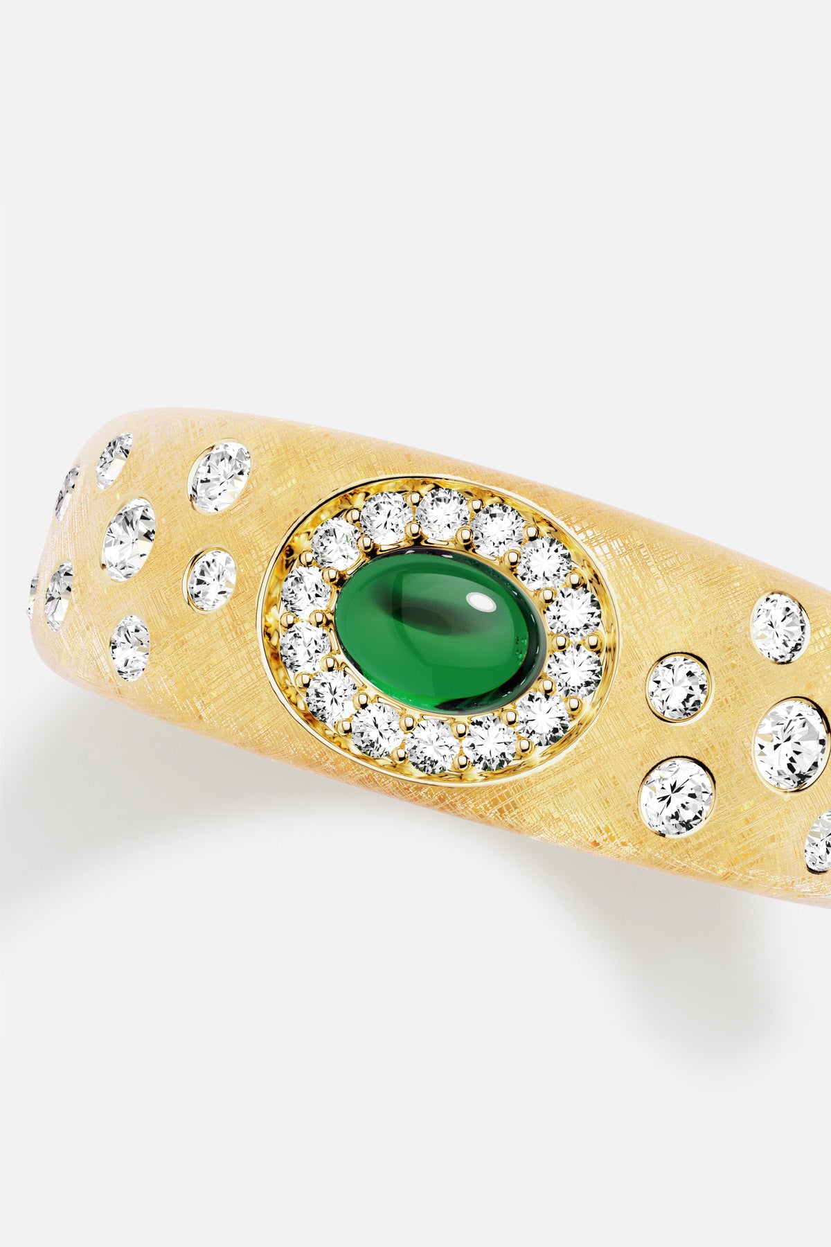 APM Ring in golden hues, a green cabochon glowing with quiet elegance.