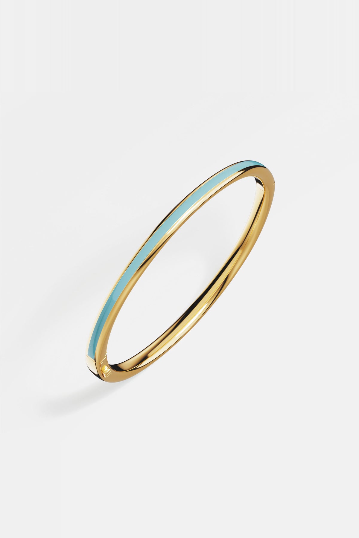 APM Bangle in golden hue and soft turquoise, effortless summer elegance.
