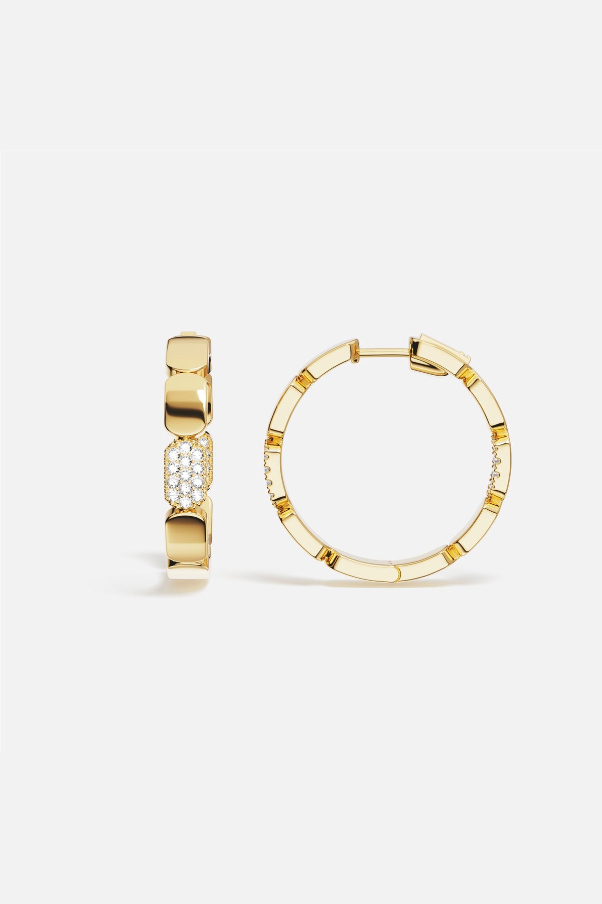 APM Hoop Earrings in gold color, a bold rhythm of modern elegance.