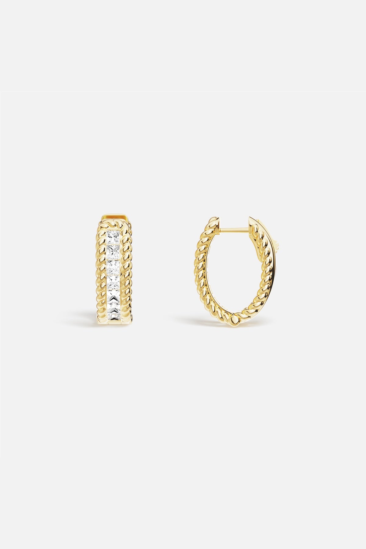 APM Hoop Earrings, twisted golden ropes framing a luminous line of light.