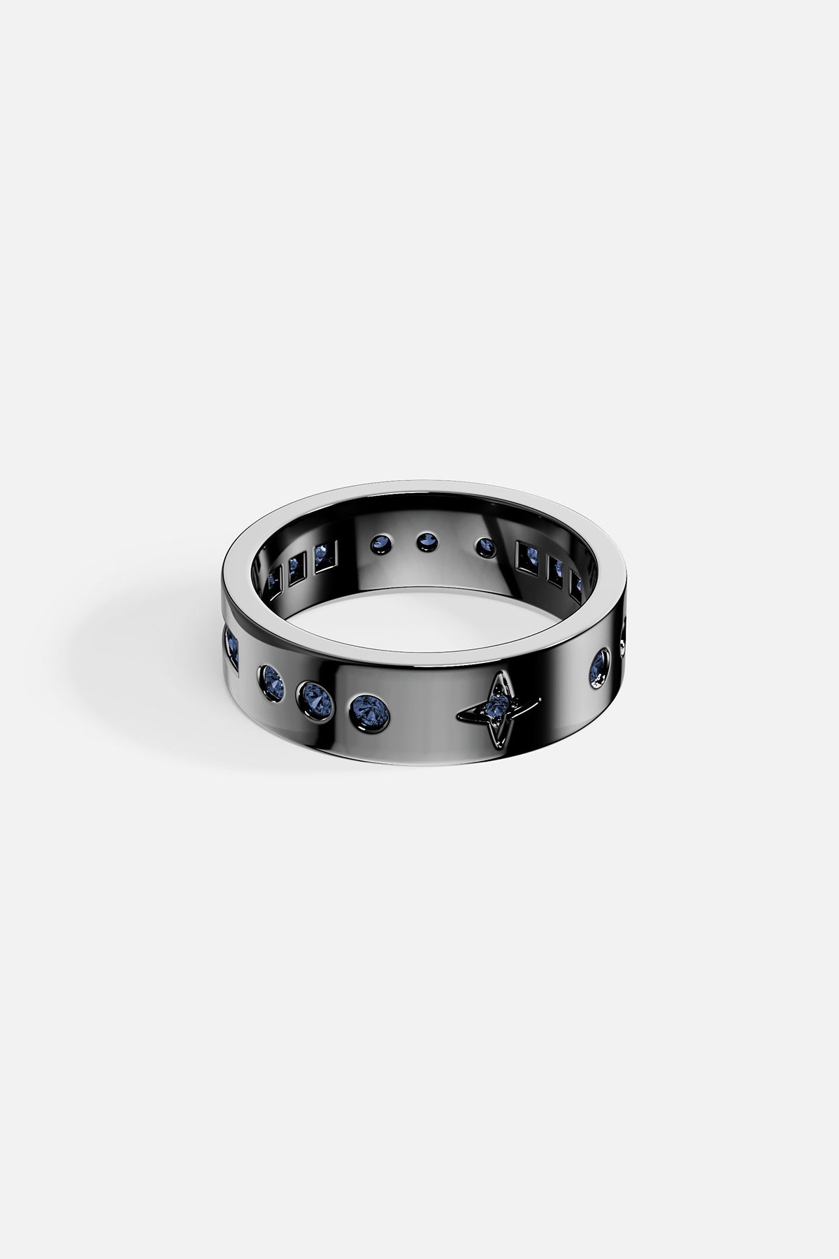 APM Ring in dark rhodium finish, scattered with blue stars for midnight allure.