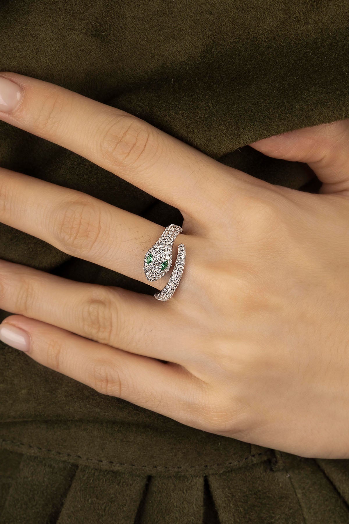 APM Kaa Wrap Ring in silver worn on hand