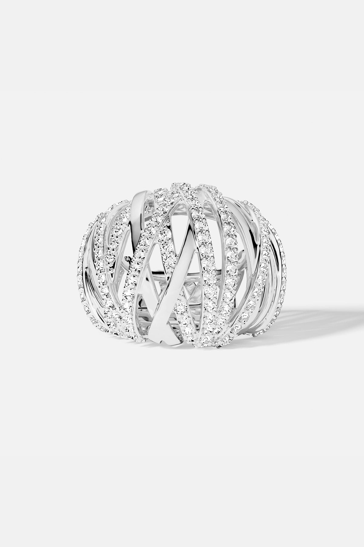 APM MONACO silver ring with interwoven design on a white background