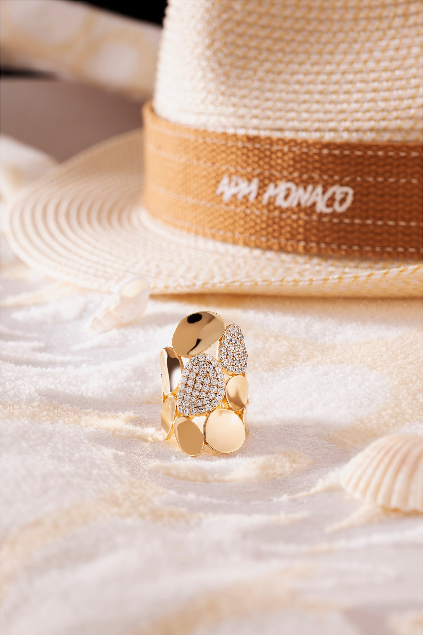 Rings APM Monaco yellow gold pavé diamond ring.