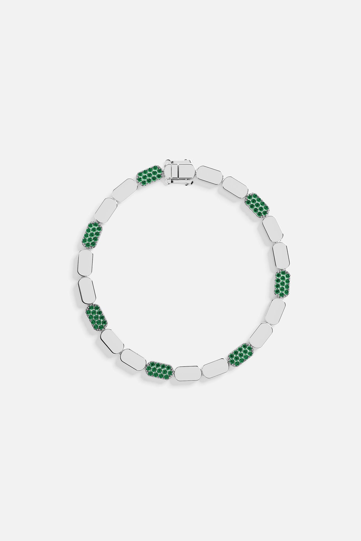 Silver bracelet with green stones on a white background