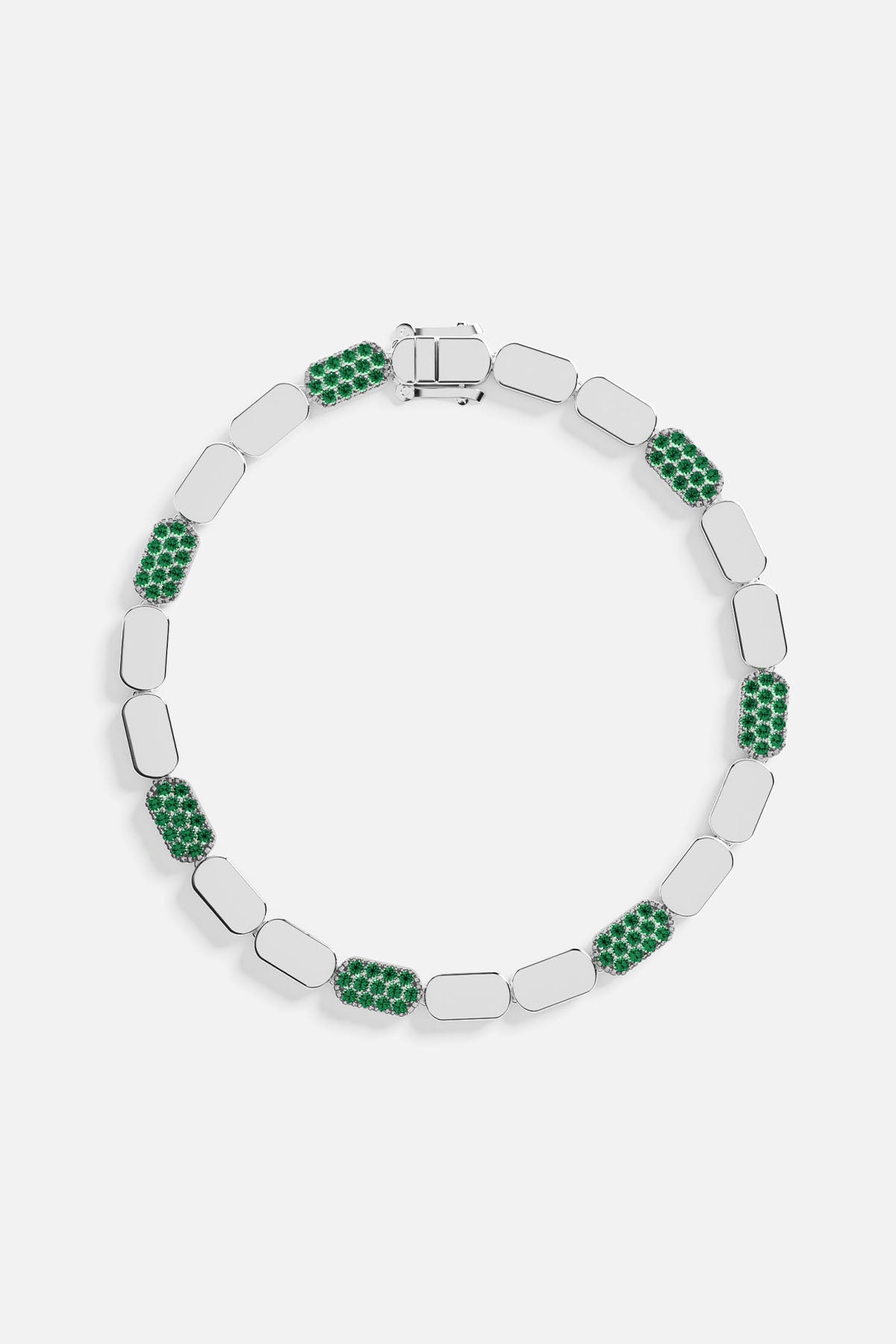 Silver bracelet with green stones on a white background