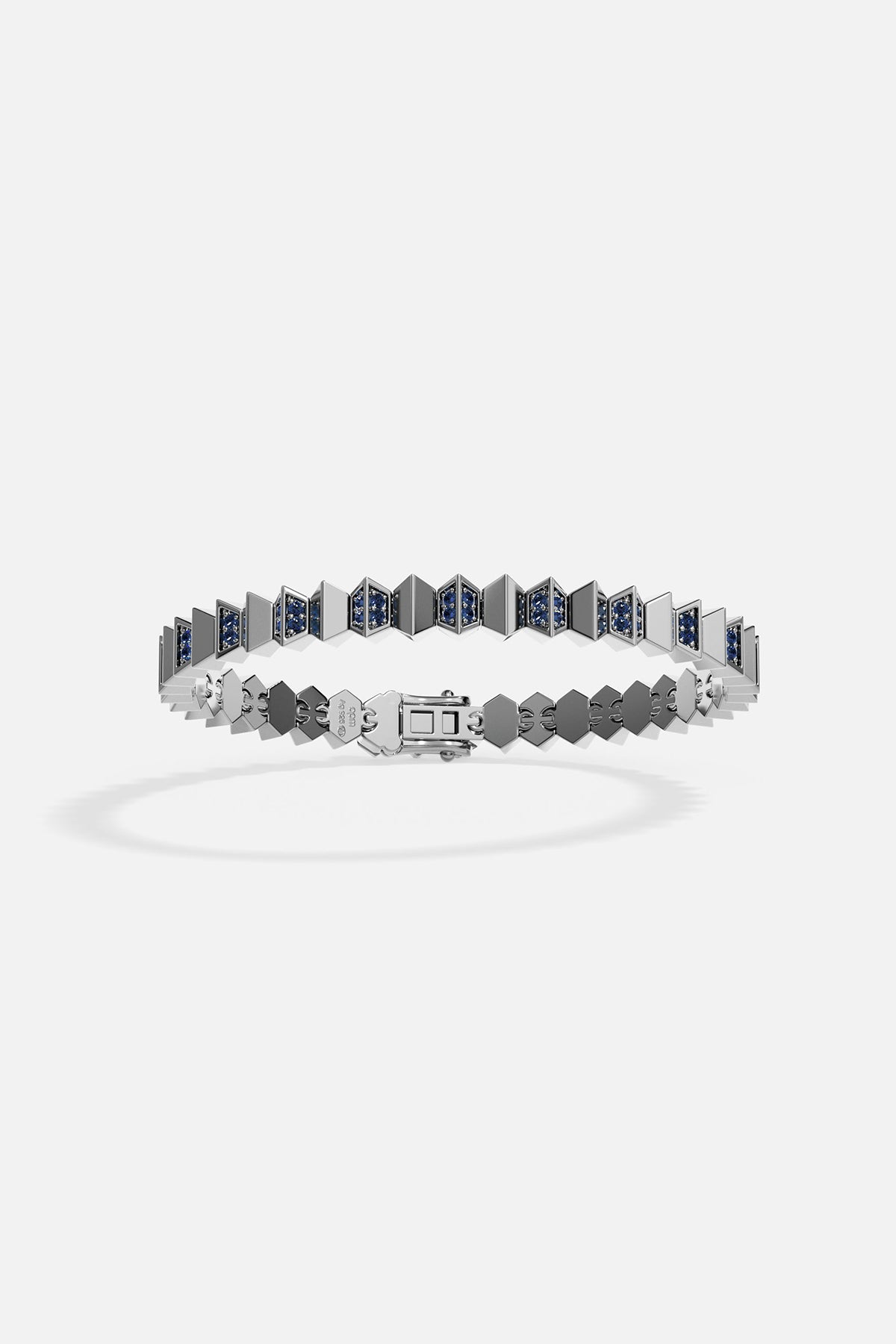Silver bracelet with geometric design on a white background
