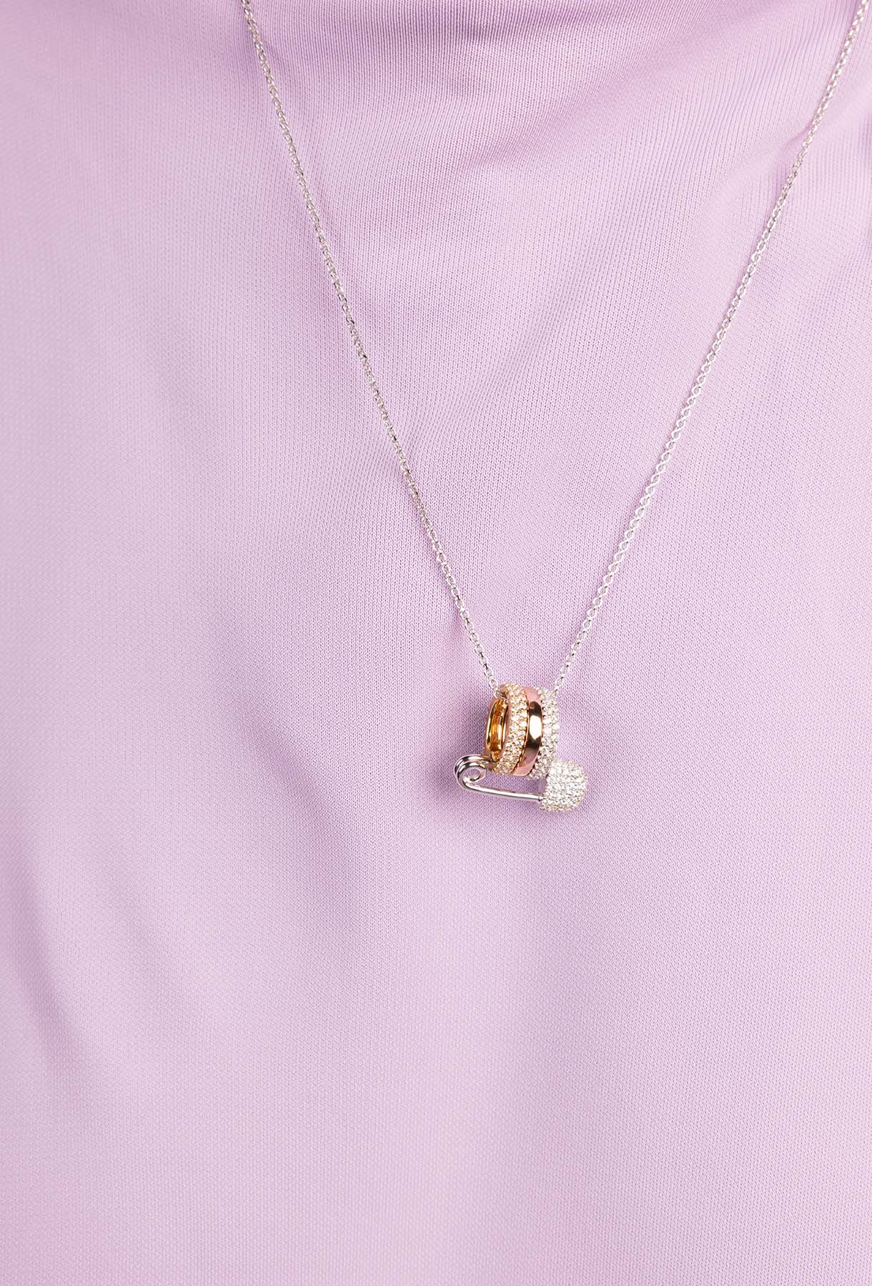 Necklace with a pendant on a light purple background