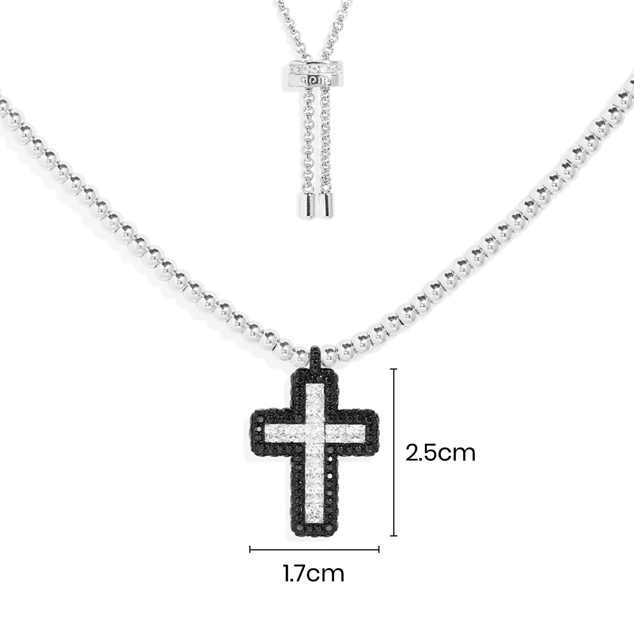 Necklaces APM Monaco: silver chain with a black and white cross pendant, approx. 2.5 cm high by 1.7 cm wide.