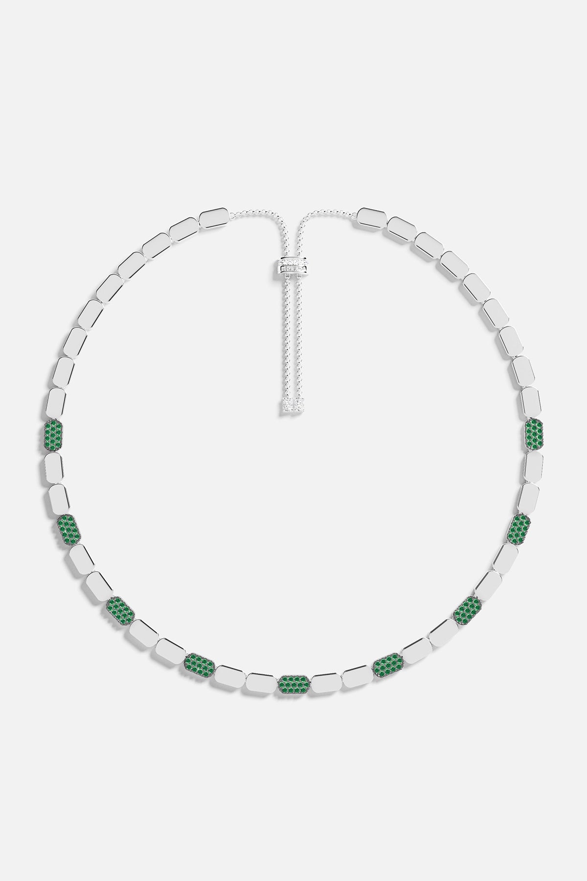 Necklace with green stones on a white background