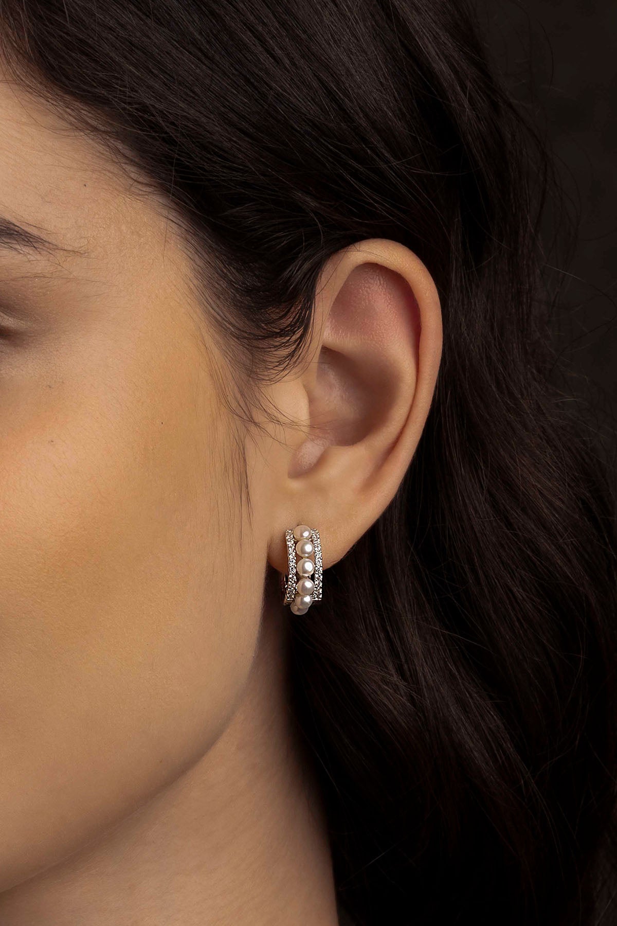 Earrings APM Monaco with a small double-paved hoop design featuring pearls.