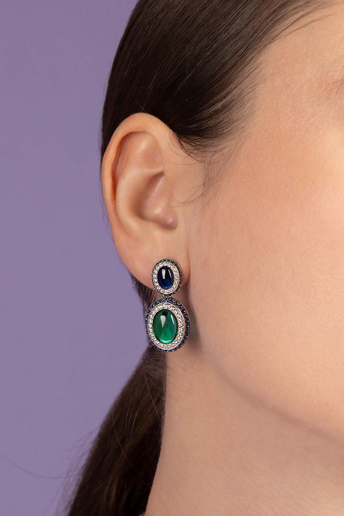 APM Monaco Bold Green and Blue Earrings Worn on ear