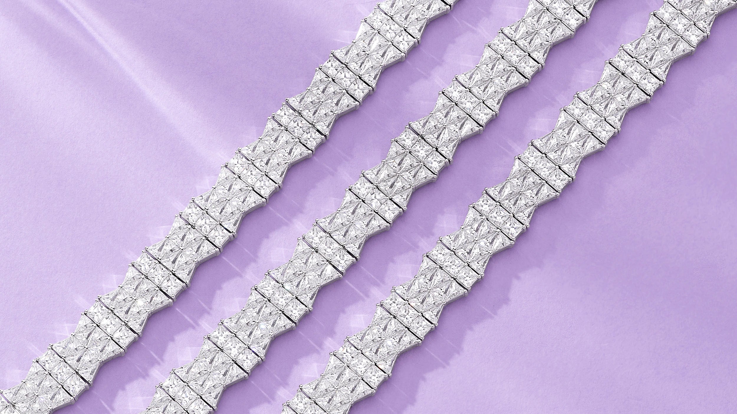 APM MONACO silver Printemps bracelets on a light purple background