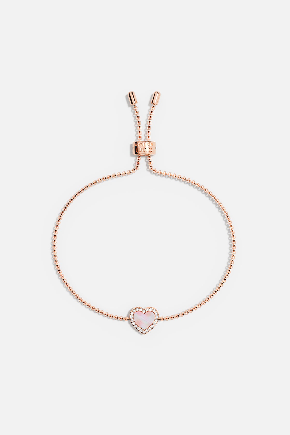 Bracelets APM Monaco rose gold adjustable bracelet with a heart pendant featuring a pink nacre center.
