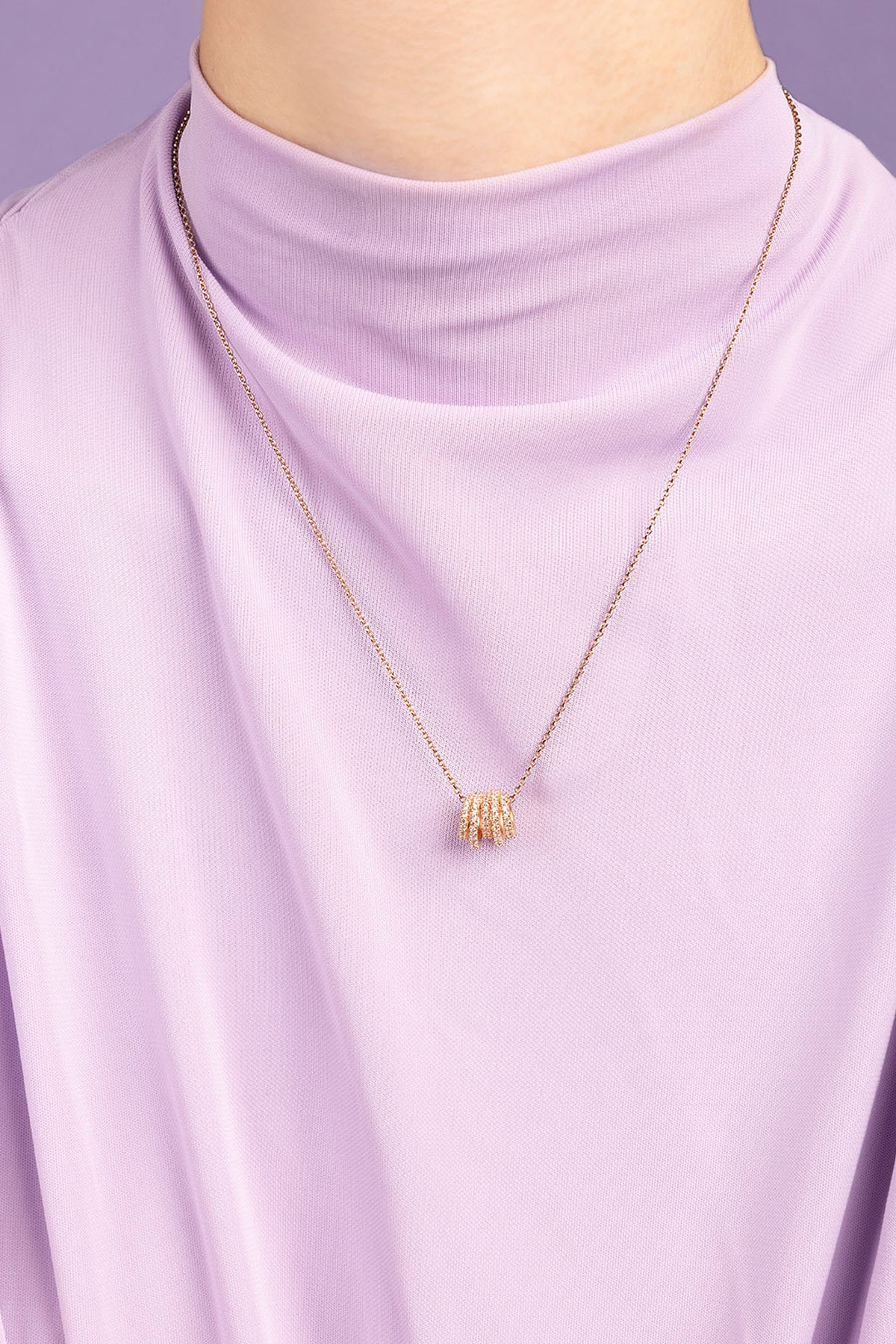 APM Monaco Rose Gold hoop Adjustable Necklace worn on model with lilac background