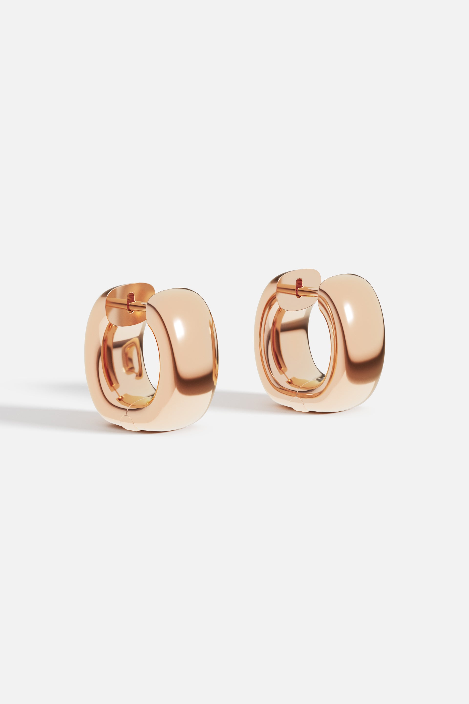 Chunky Rose Gold Huggie Earrings | APM Monaco