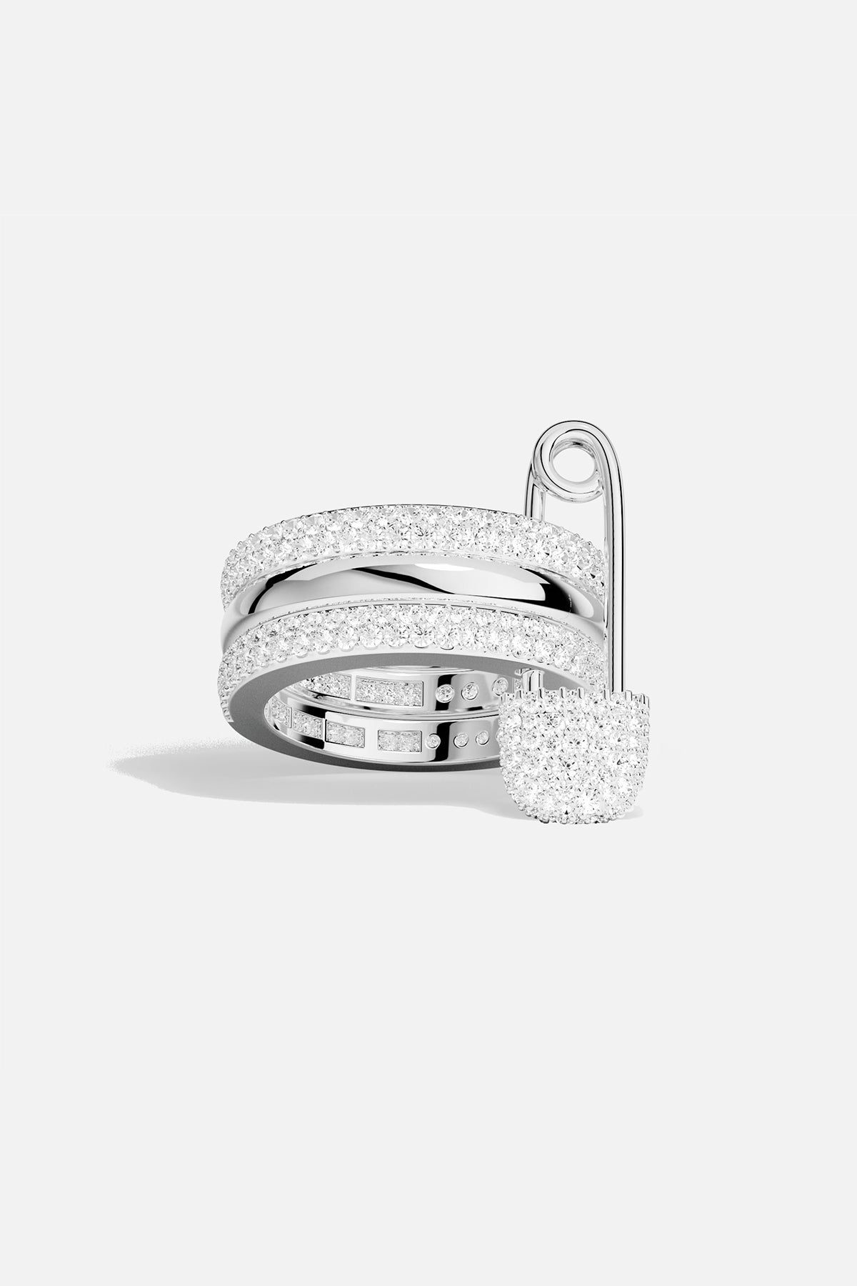 APM MONACO love smile bonheur triple pin ring on white background