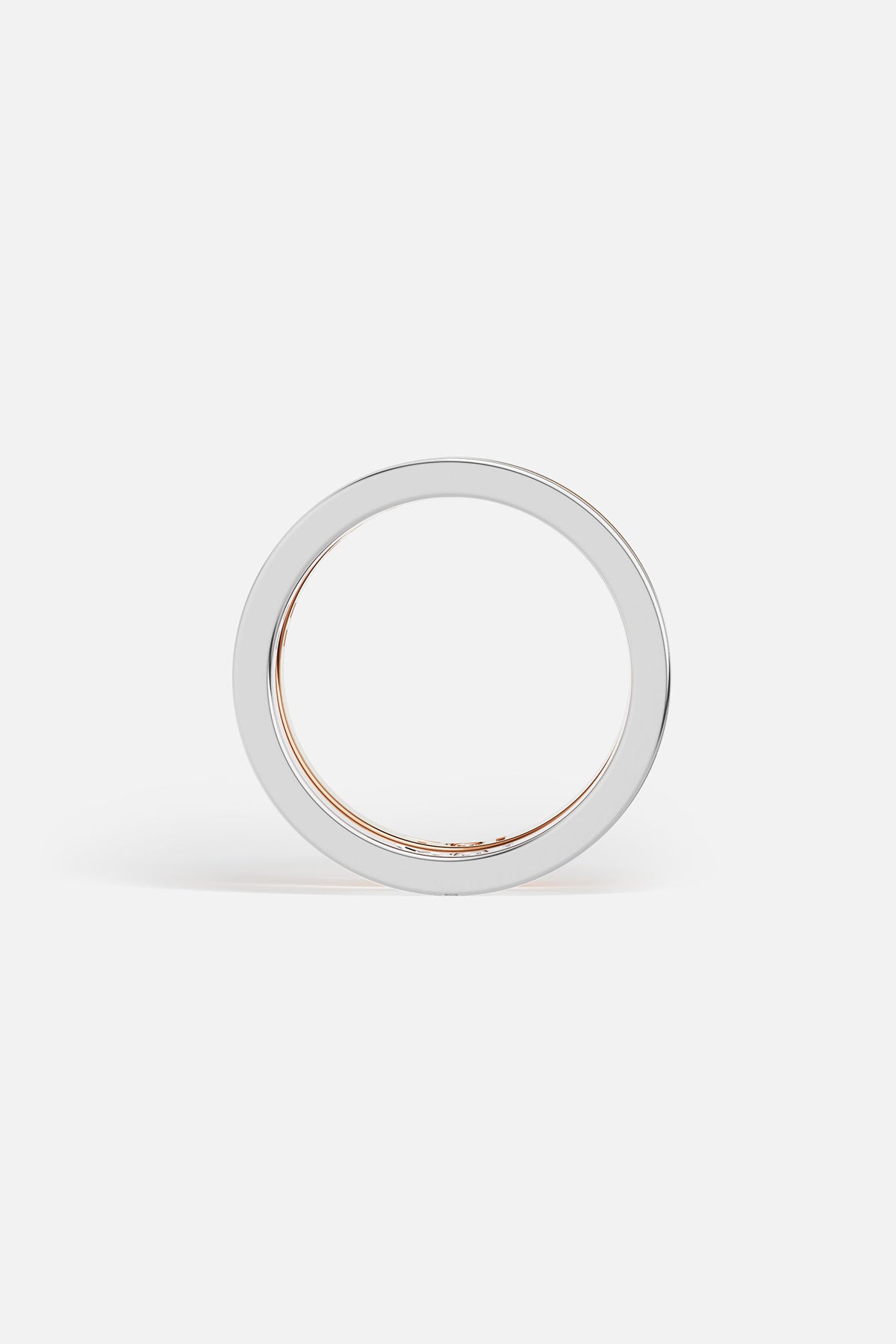 Rings APM Monaco: three stacked rings in white metal with MOI, rose gold with TOI, and yellow gold with white cubic zirconia.