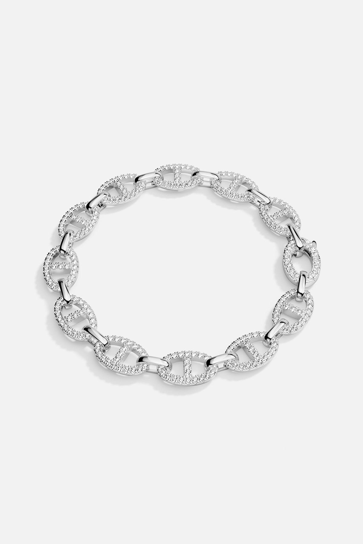 Silver bracelet with interlocking links on a light gray background
