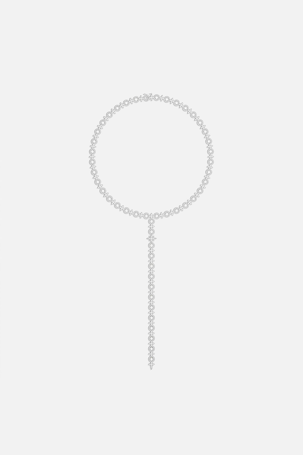 Necklaces APM Monaco. Silver-tone-tone choker with circular link band and elongated strand featuring pavé circles and teardrop stones in a Y-drop design.