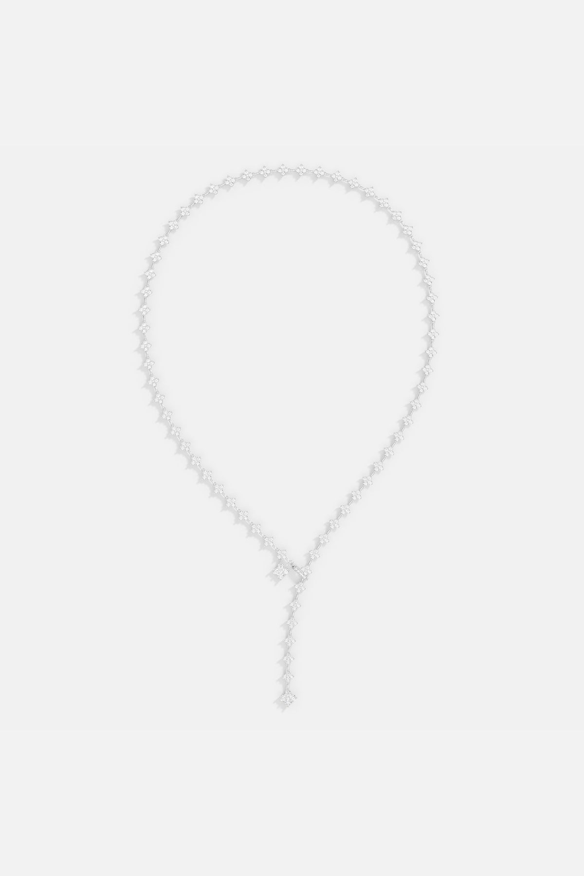 Necklaces APM Monaco silver-tone Y-drop adjustable necklace with linked four-petal flower motifs and a drop pendant.