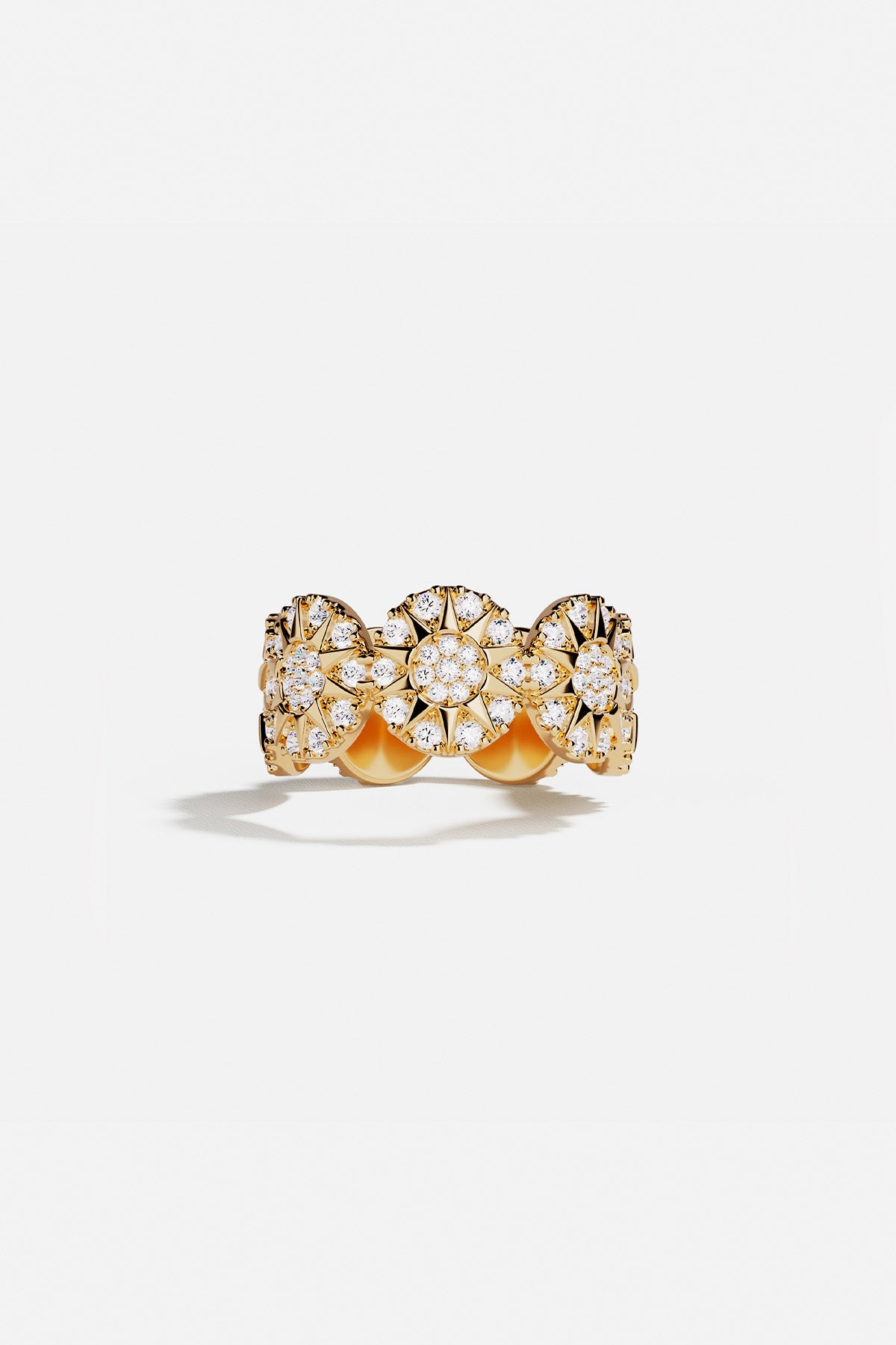 Ring, APM Monaco, yellow gold sunburst design with a starburst motif; statement style with no visible stones.
