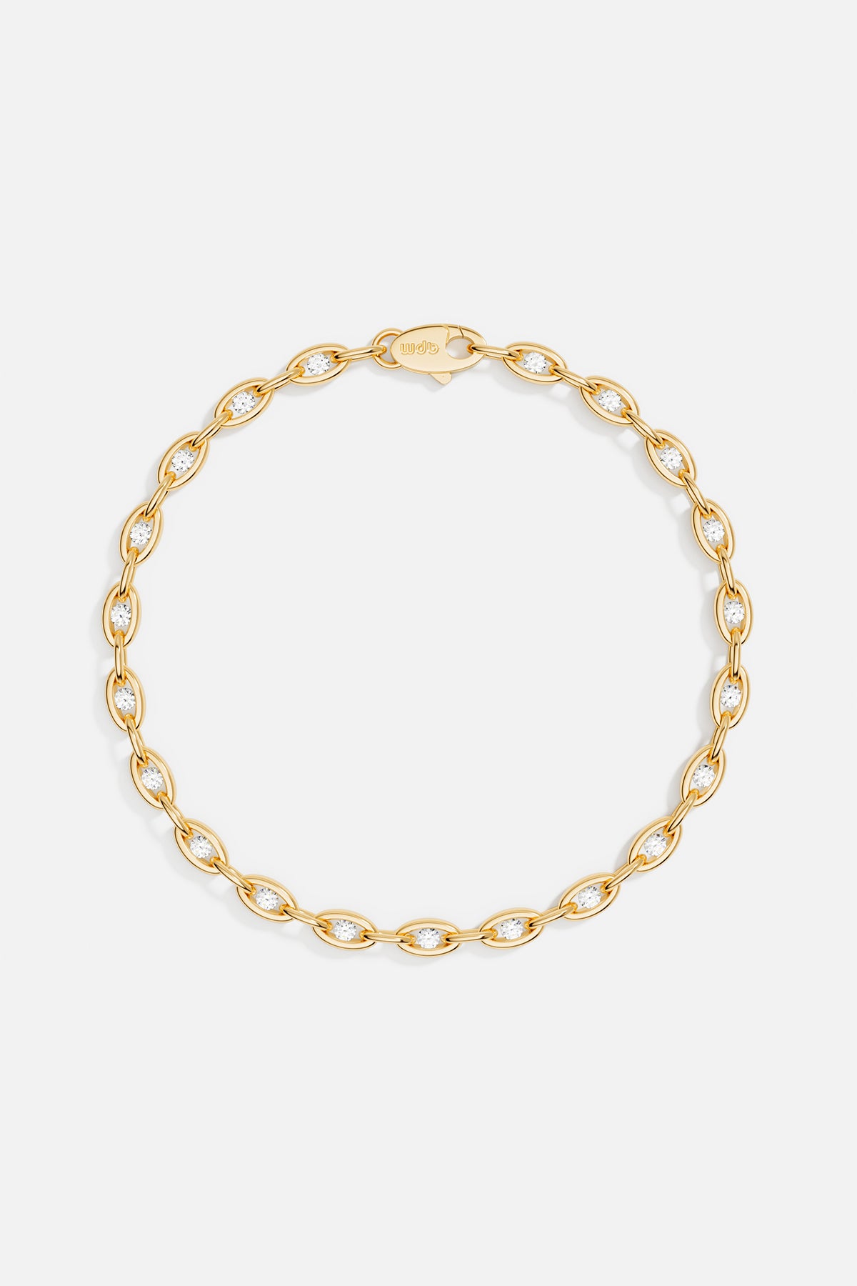 Bracelets APM Monaco, yellow gold pavé chain bracelet with small diamonds between each oval link.