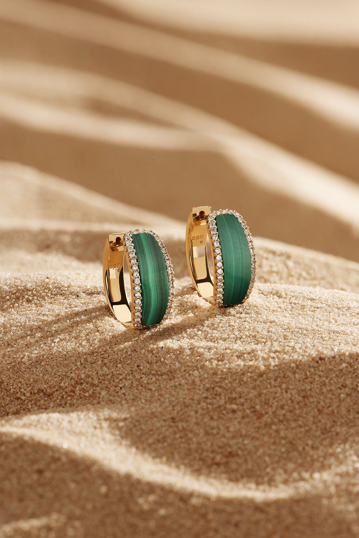 Earrings APM Monaco: yellow gold hoop earrings with malachite-green stones and diamond accents.
