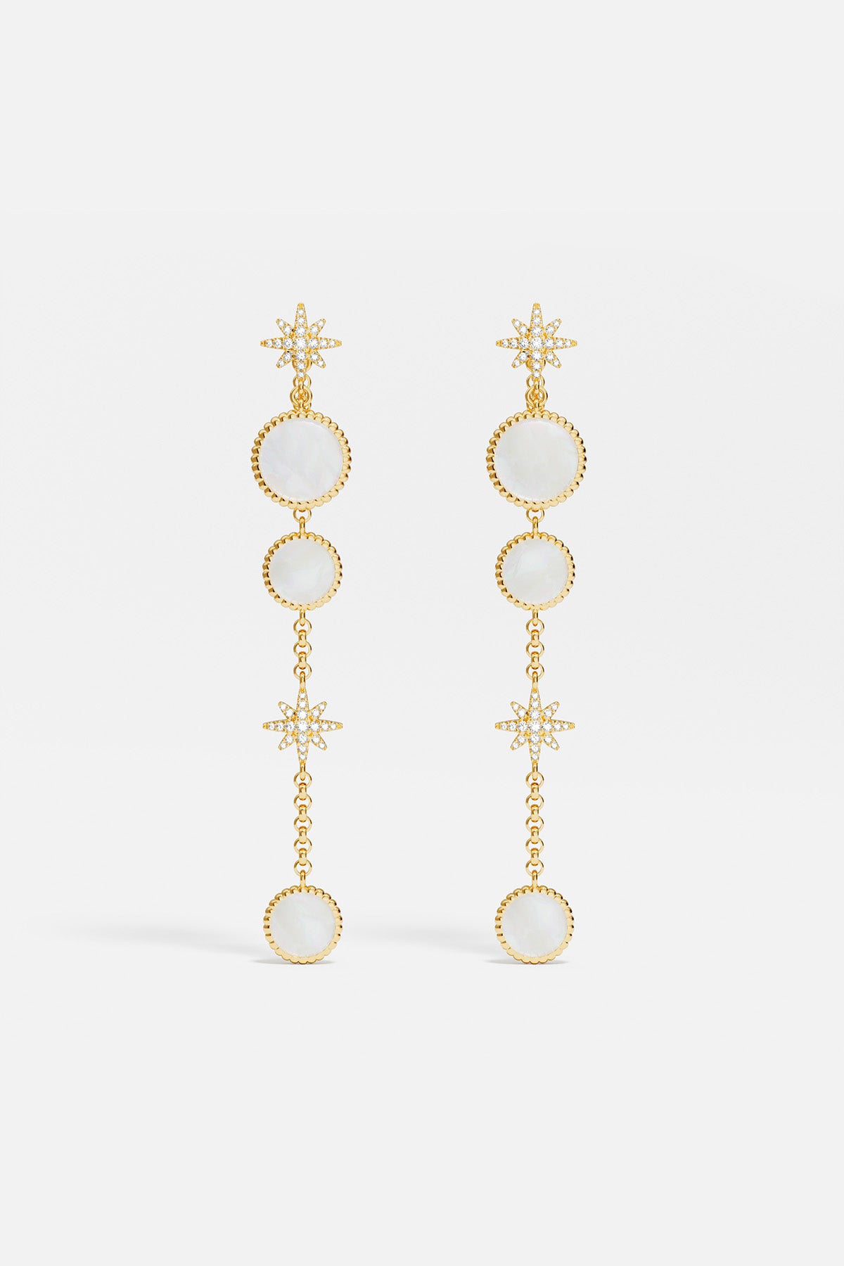 Earrings APM Monaco ear jackets, white nacre with a star motif and round opalescent stones