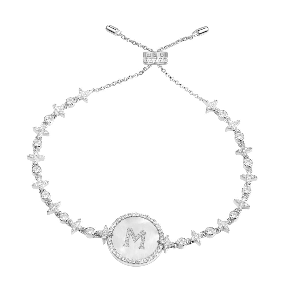 Bracelets APM Monaco pavé crystal bracelet with a white/silver initial M charm.