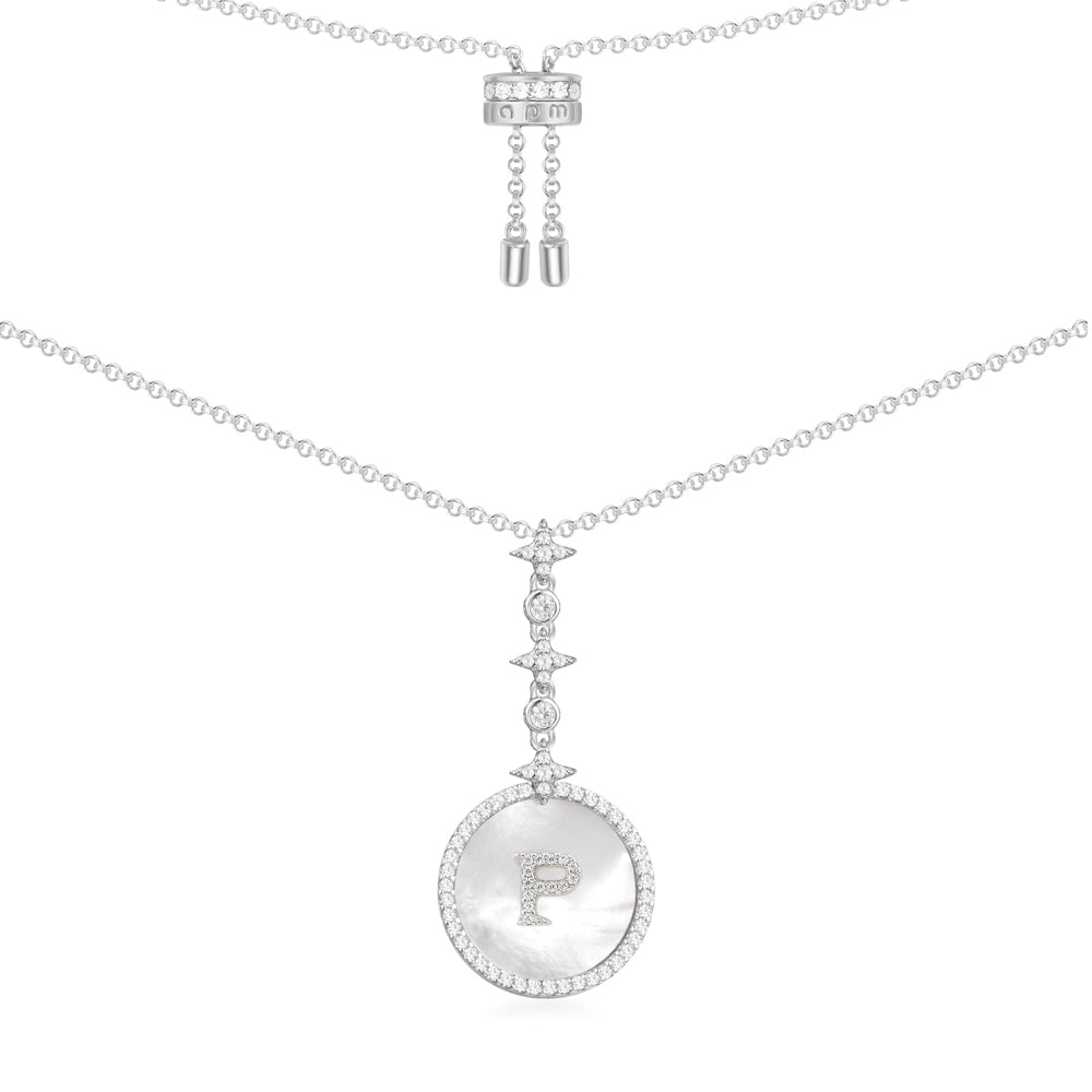 Necklaces APM Monaco. White chain with a circular pendant featuring a capital letter 'P' at the center and pave crystals around the edge.