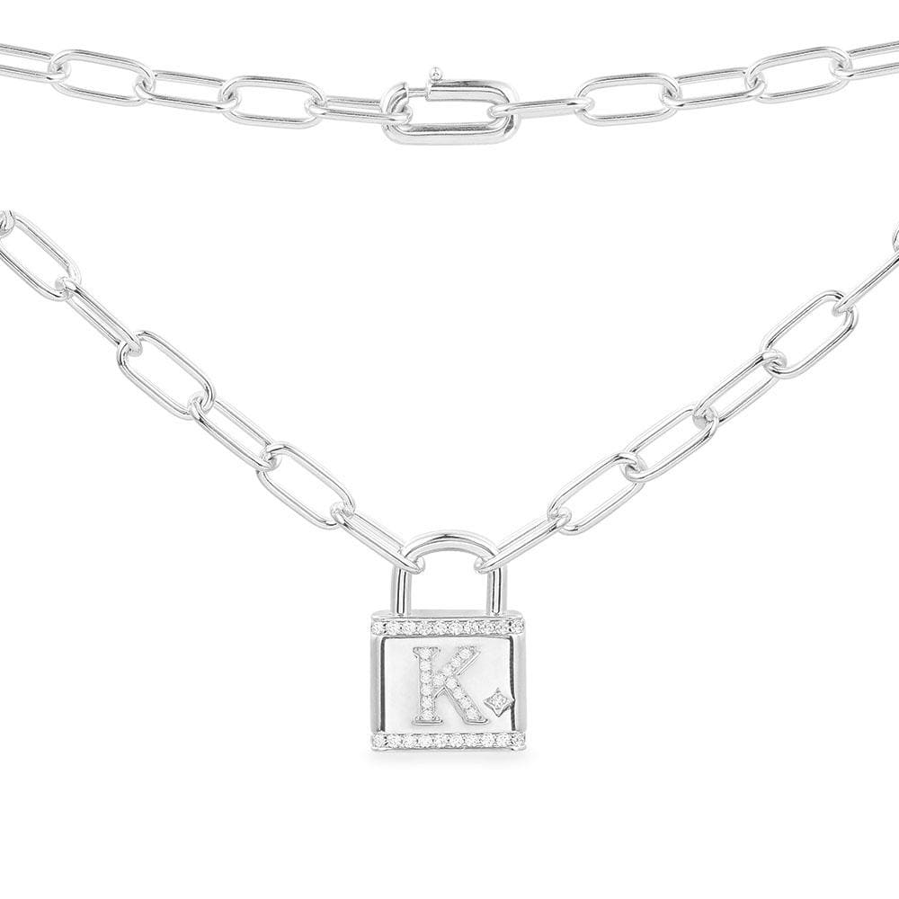 Necklaces APM Monaco white chain with an initial K lock pendant.