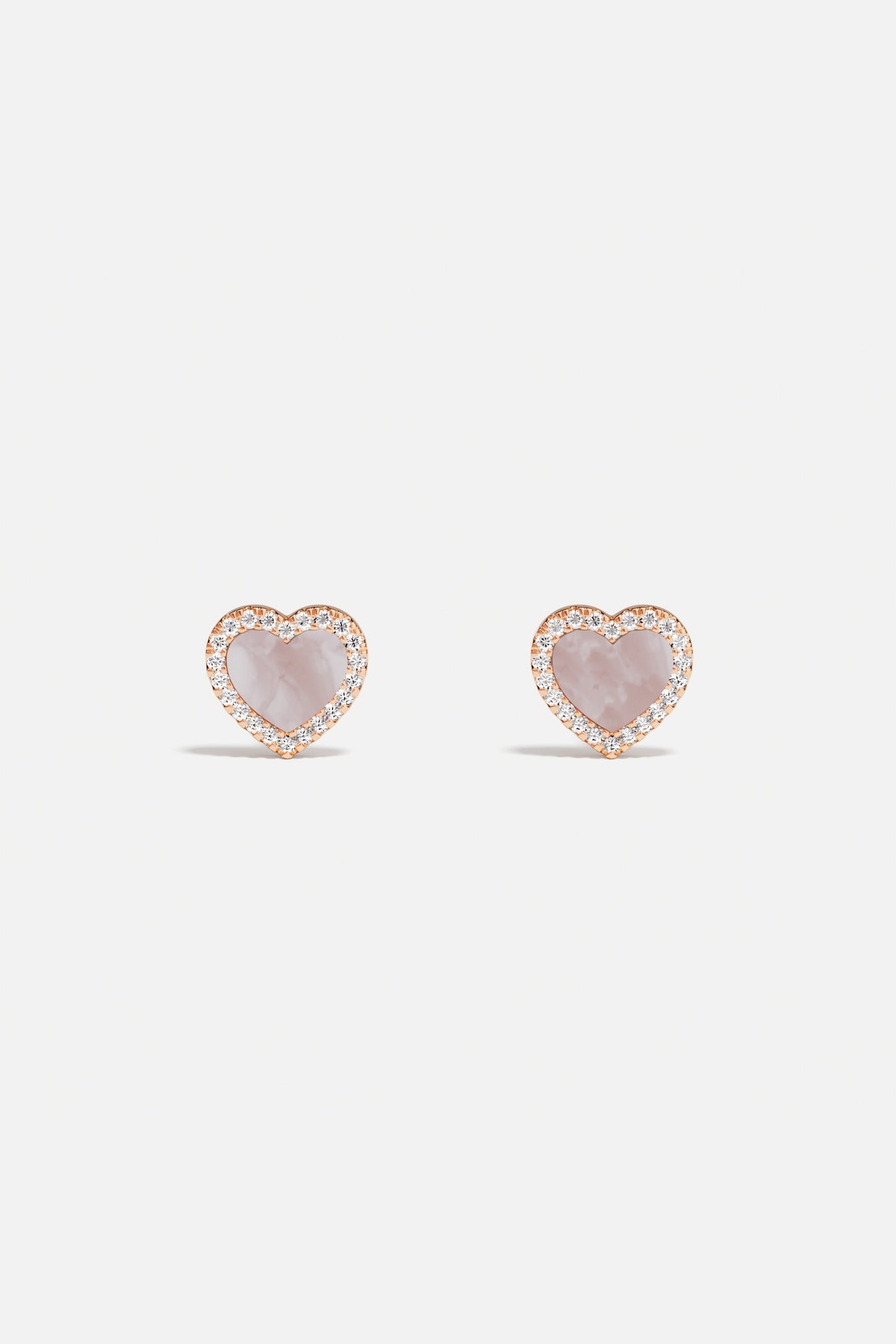 APM Heart Earrings, a tender rose glow whispering pure romance.