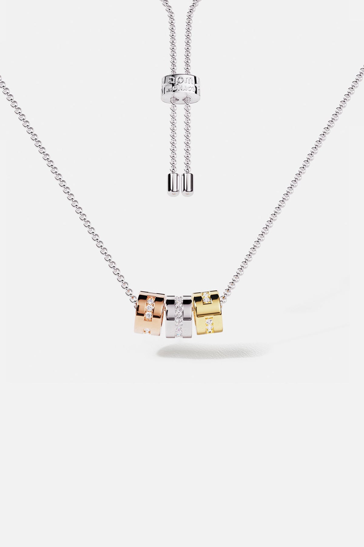 APM Necklace with three tri-color rings, an effortless play of modern elegance.