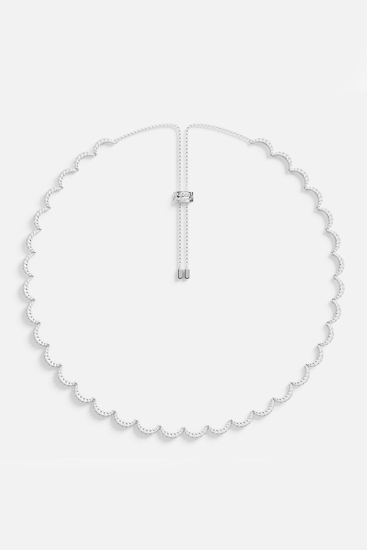 APM Necklace with scalloped shimmer, a delicate wave of light around the neck.