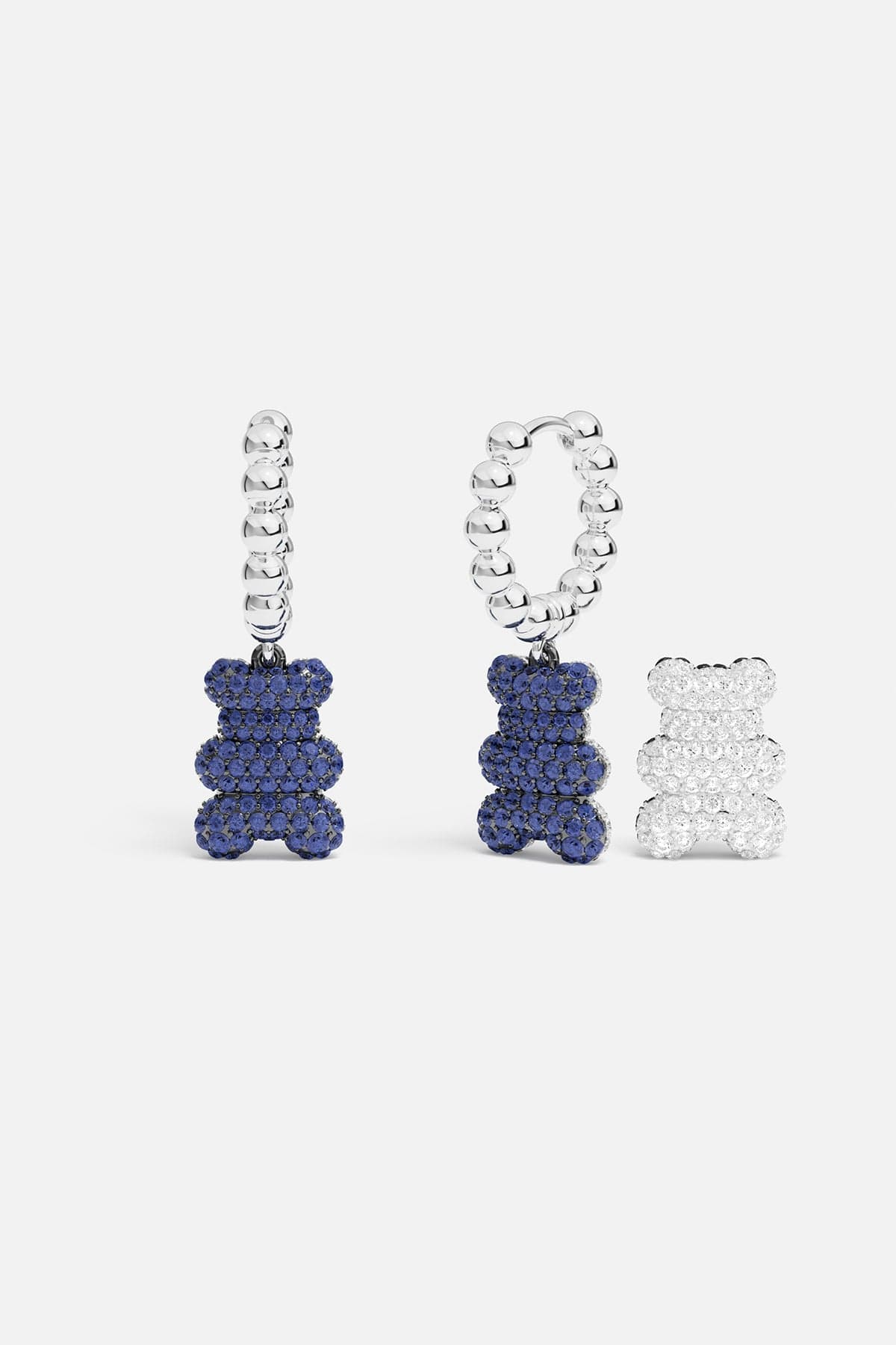 APM Yustin Bear Earrings, playful charm in deep blue and crystal sparkle.