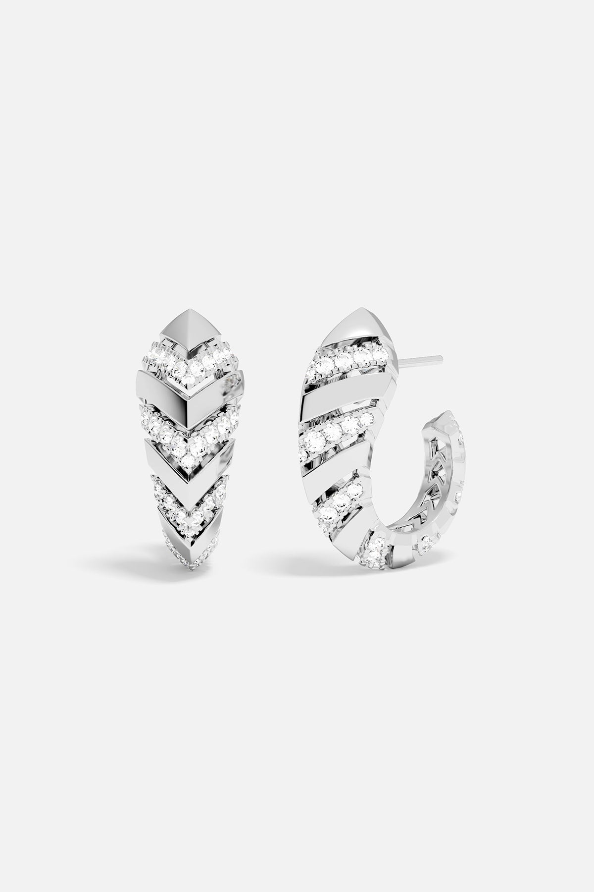 APM Hoop Earrings, sculpted chevrons in rhodium finish, radiating quiet modern edge.