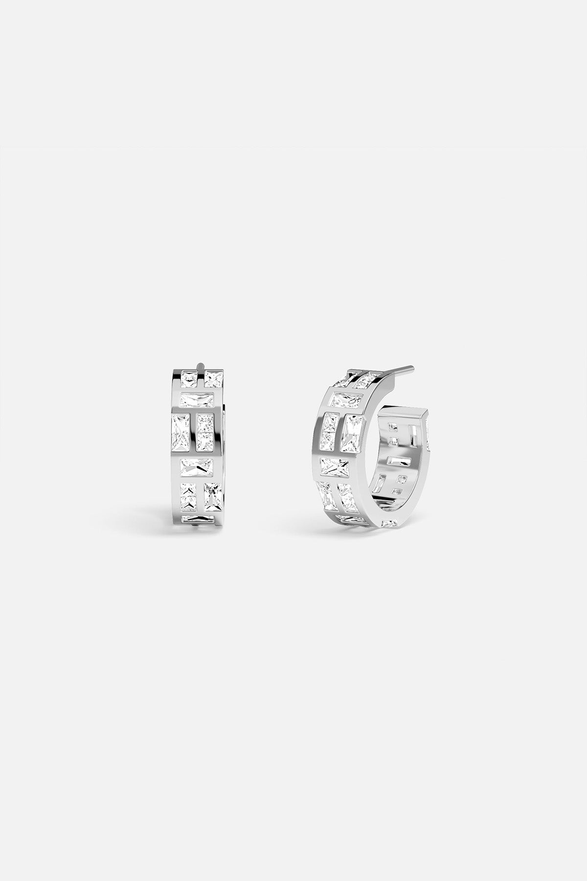 APM Hoop Earrings in rhodium finish, a modern mosaic of light and elegance.