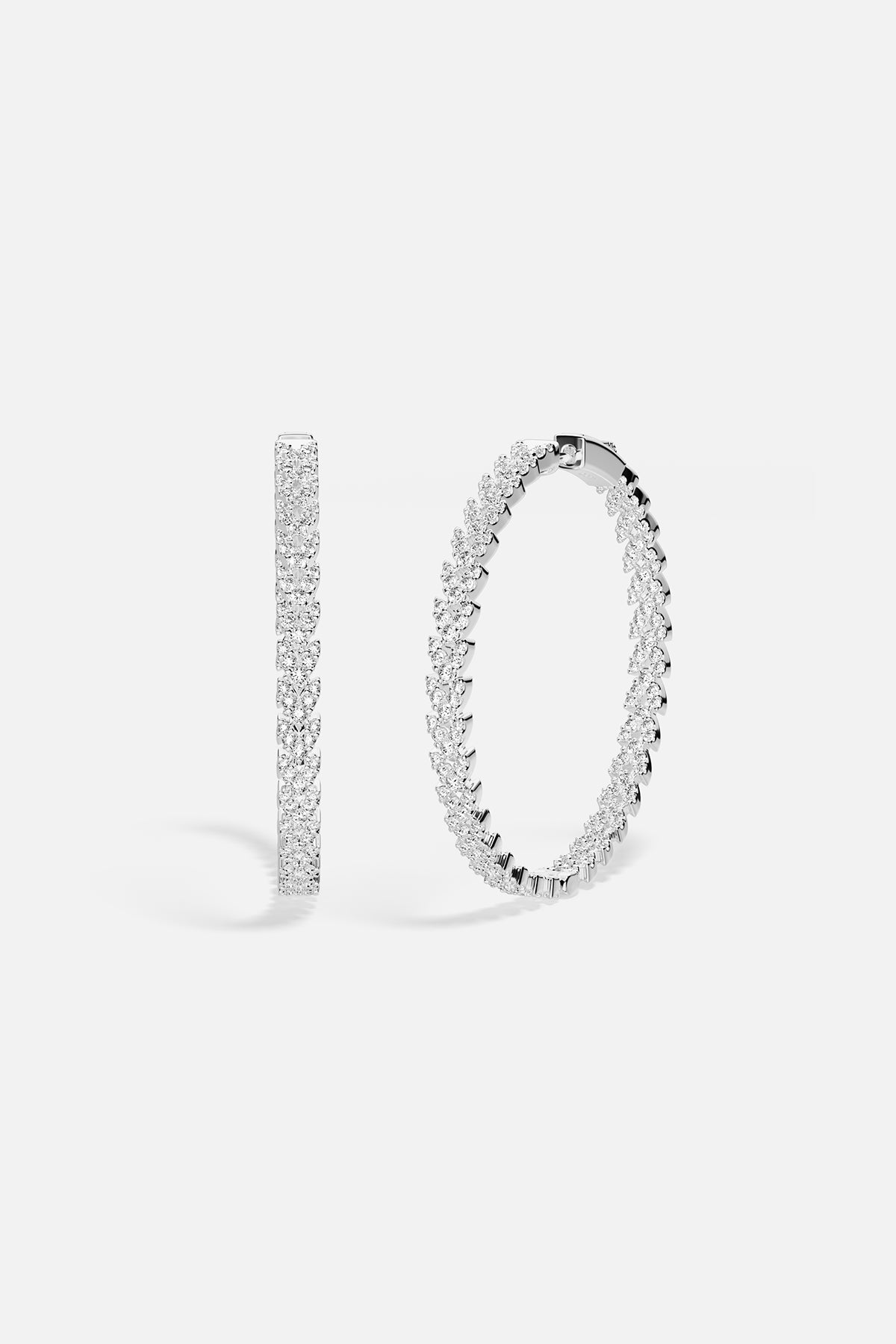 APM Hoop Earrings in rhodium finish, radiant sparkle circling effortless everyday elegance.